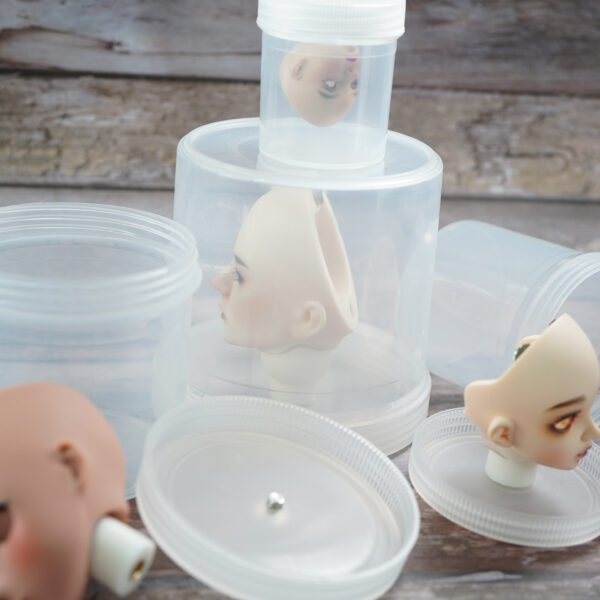 Doll head shipping containers